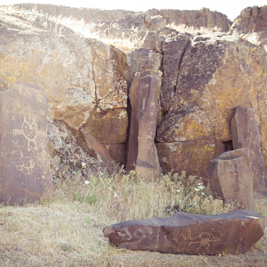 outcropping of rocks with native petroglyphs where indigenous peoples once lived lived