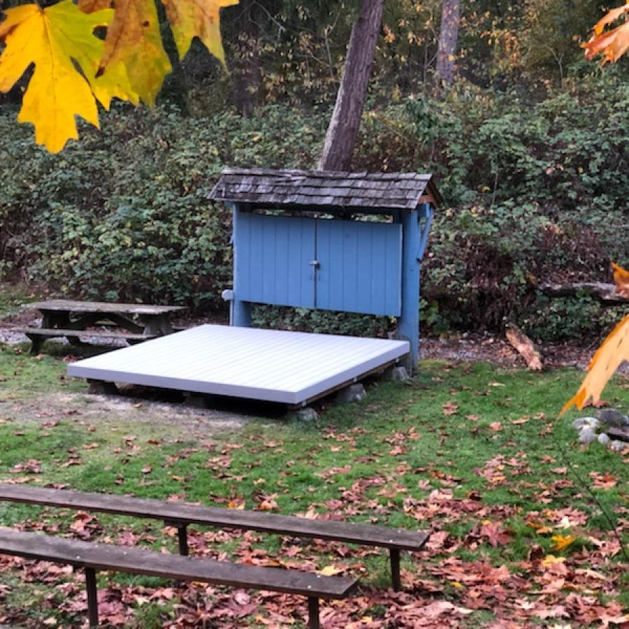 Amphitheater with seating and fall leaves 