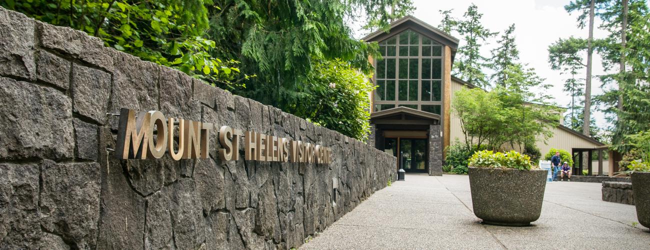 rock wall metal lettering sign Mount St Helens Visitor Center