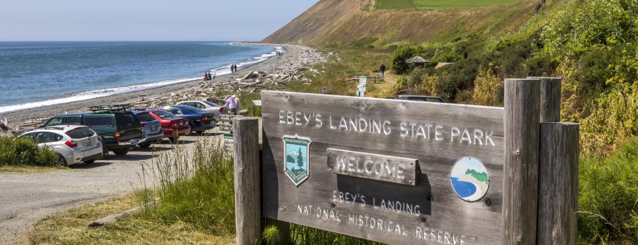 park entrance sign by beach