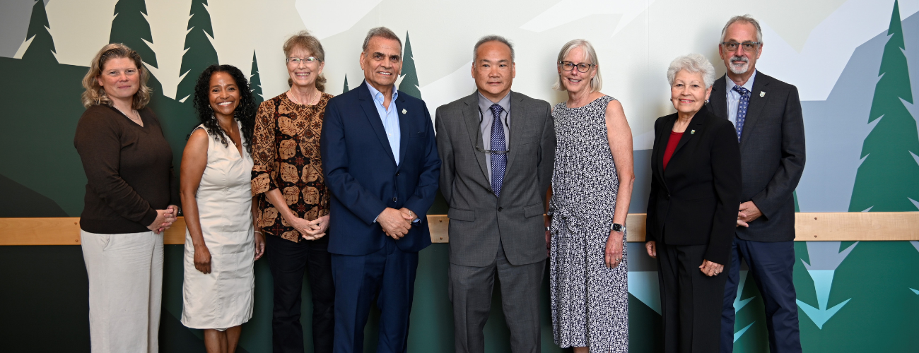Left to right pictured, Director Dupuis, Commissioner Danenberg, Vice Chair Williams, Secretary Raad, Commissioner Latimer, Chair Connelly, Commissioner Alavarado-Ramos and Commissioner Merriman 