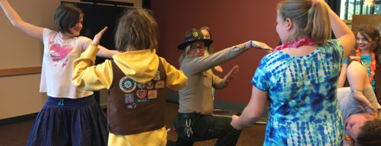 Girl Scouts playing games with our interpretive rangers