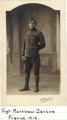 A sepia toned portrait of a soldier in uniform.