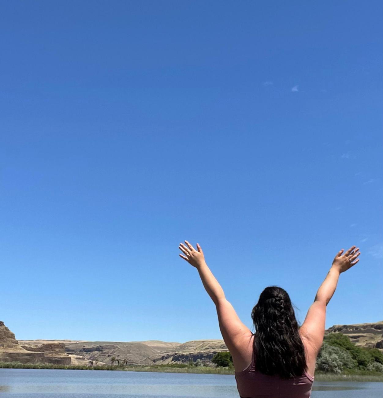 Woman with her arms in the air