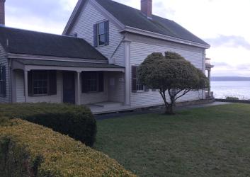 historic house with well kept landscaping