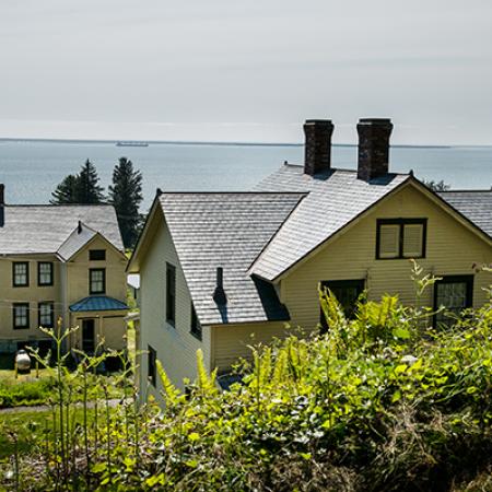 View of the vacation rentals with the ocean in the background.