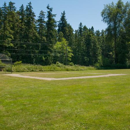 The ball field on a sunny day at Sequim Bay State Park.