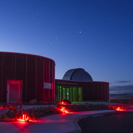 Goldendale Observatory at night with Mars, Saturn and Jupiter in the sky.
