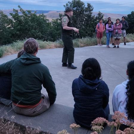 Goldendale Observatory Interpretive Specialist Troy Carpenter talking to a group of kids during one the parks' interpretive programs about the night sky.