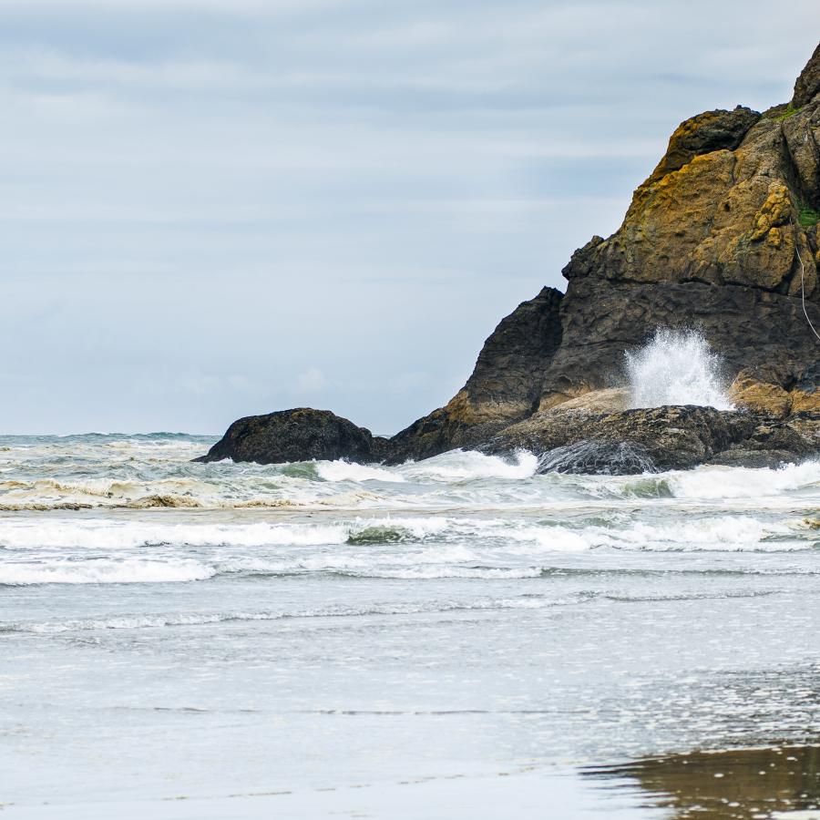 Waves crashing against the rock at Cape Disappointment.