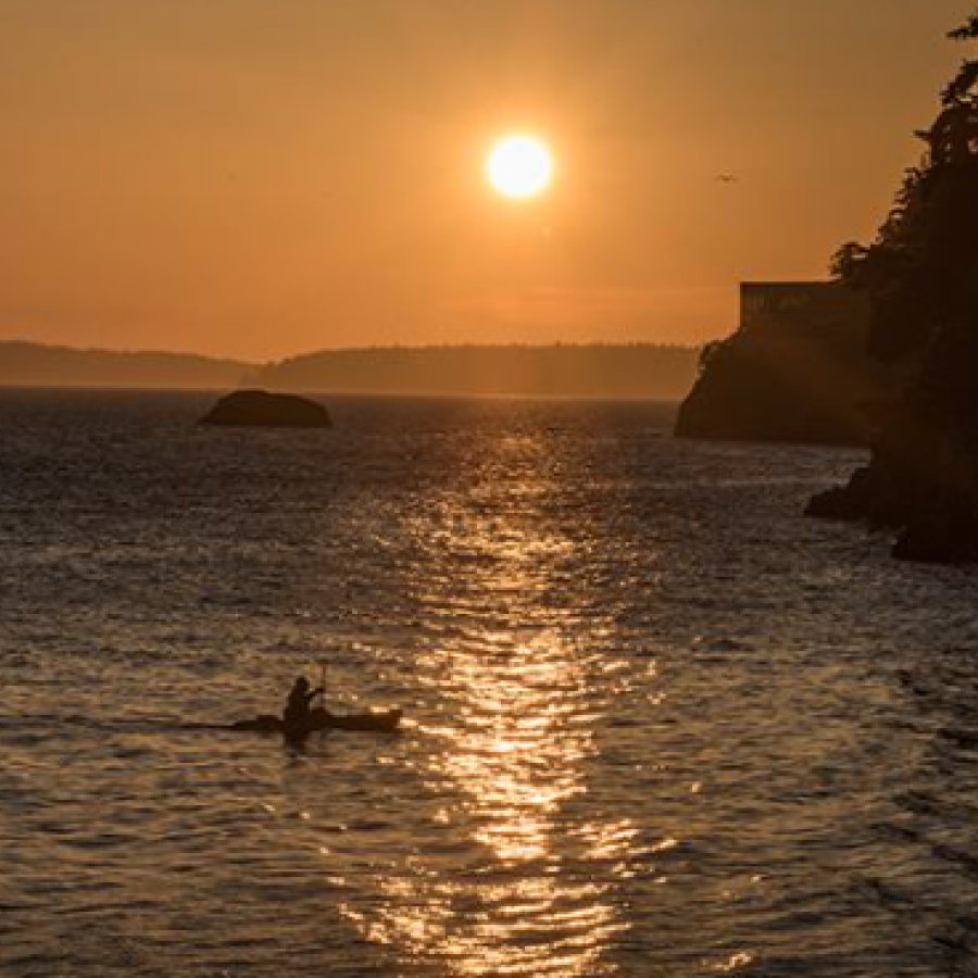 Kayaking during sunset 