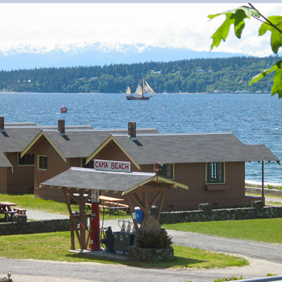 Cama Beach Saratoga Vista with cabins and tall ship