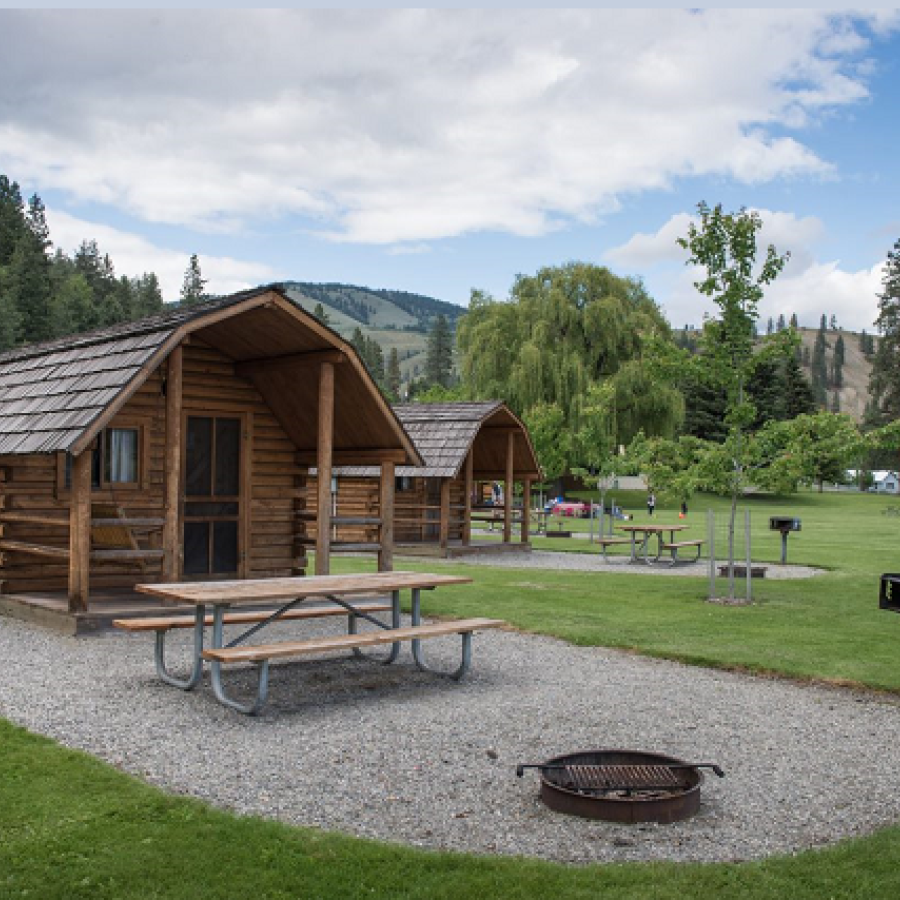 Conconully Cabin Exterior with firepit and picnic table