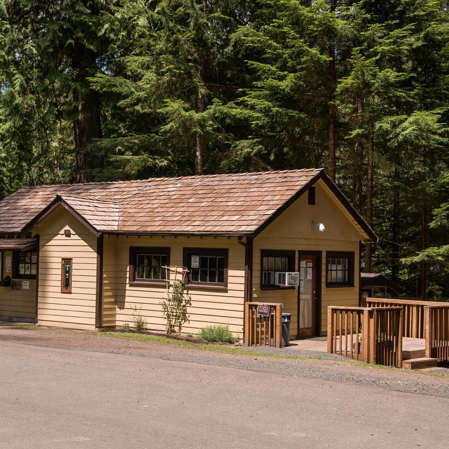 tan and brown ranger station at park entrance