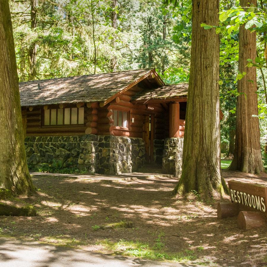 Lewis & Clark large campground bathroom building made of stone and wood