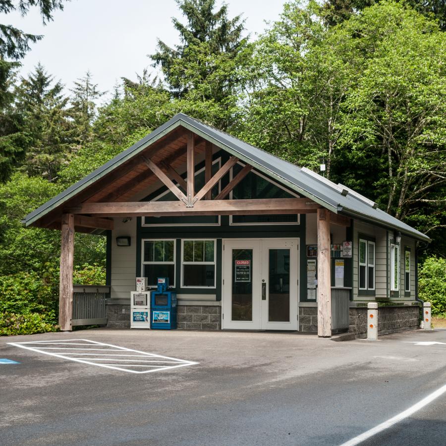 Ranger Station of green roof and wood pole barn style shelter.