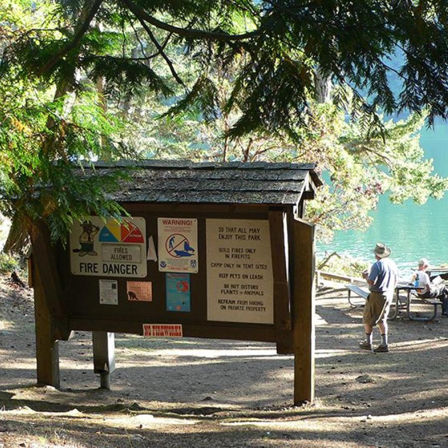 Island Information Sign at intersection of trails and dock
