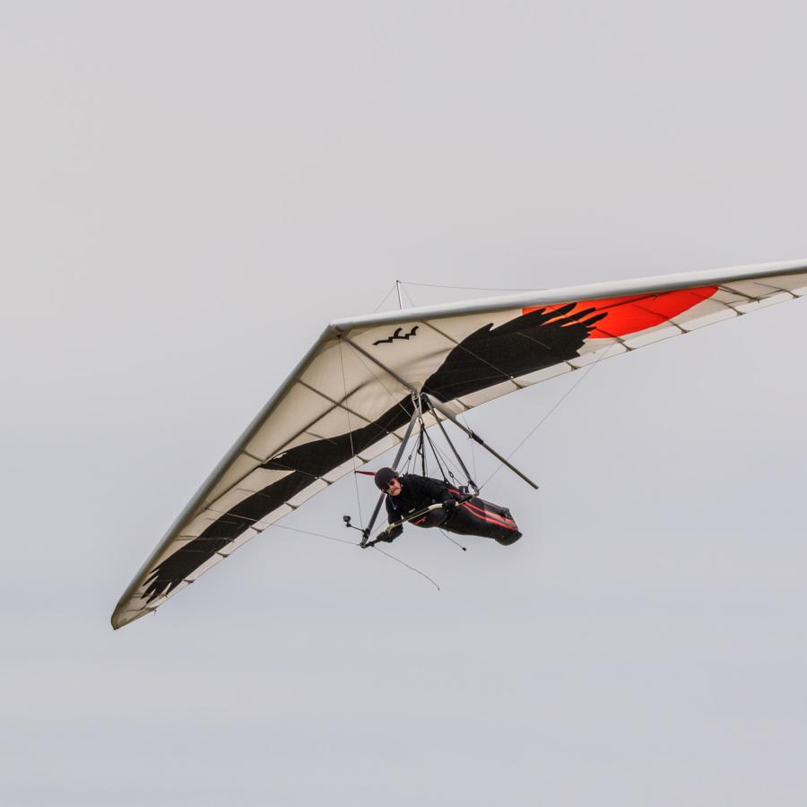 Hang gliding in the sky.