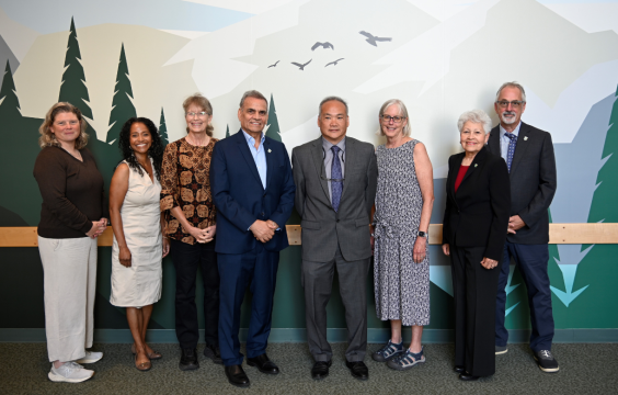 Left to right pictured, Director Dupuis, Commissioner Danenberg, Vice Chair Williams, Secretary Raad, Commissioner Latimer, Chair Connelly, Commissioner Alavarado-Ramos and Commissioner Merriman 